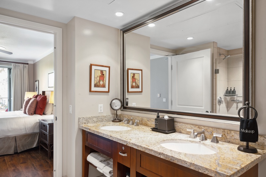 Dual granite vanities at Honua Kai Konea 204 offer the perfect setup for couples to refresh in style.