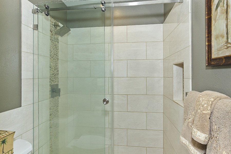Relax and unwind in the custom walk-in shower.