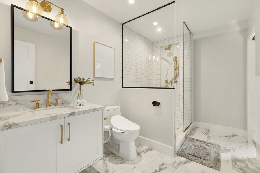Ensuite with single vanity and walk-in shower