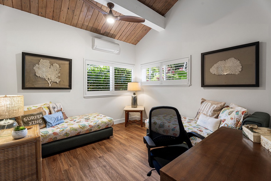 Settle into a cozy guest room, perfect for rest, reading, or planning the day ahead.