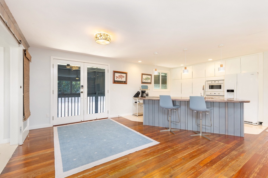 Enjoy a seamless indoor flow from kitchen to lanai, perfect for entertaining or unwinding after the beach.