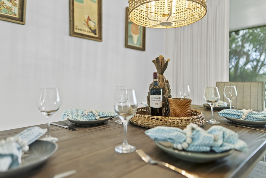 Elegant dining setup with coastal-themed décor, perfect for intimate meals.