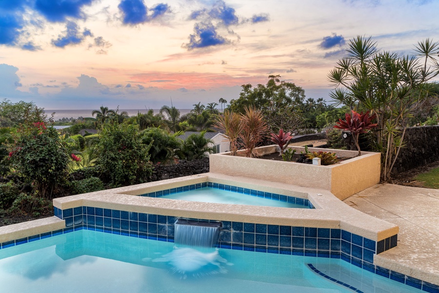 Inviting poolside ambiance surrounded by lush greenery and tropical serenity.