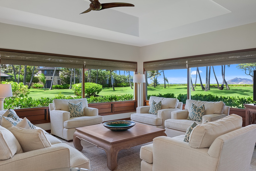 Formal living space in the beach house with cozy seating and panoramic ocean views.