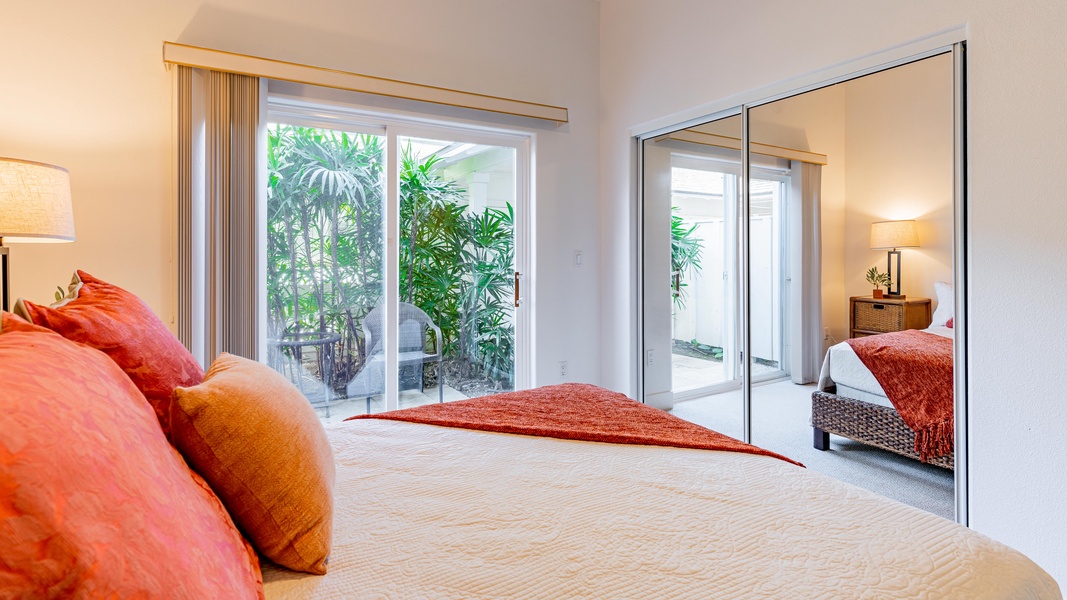 The first floor guest bedroom with access to a small private lanai.