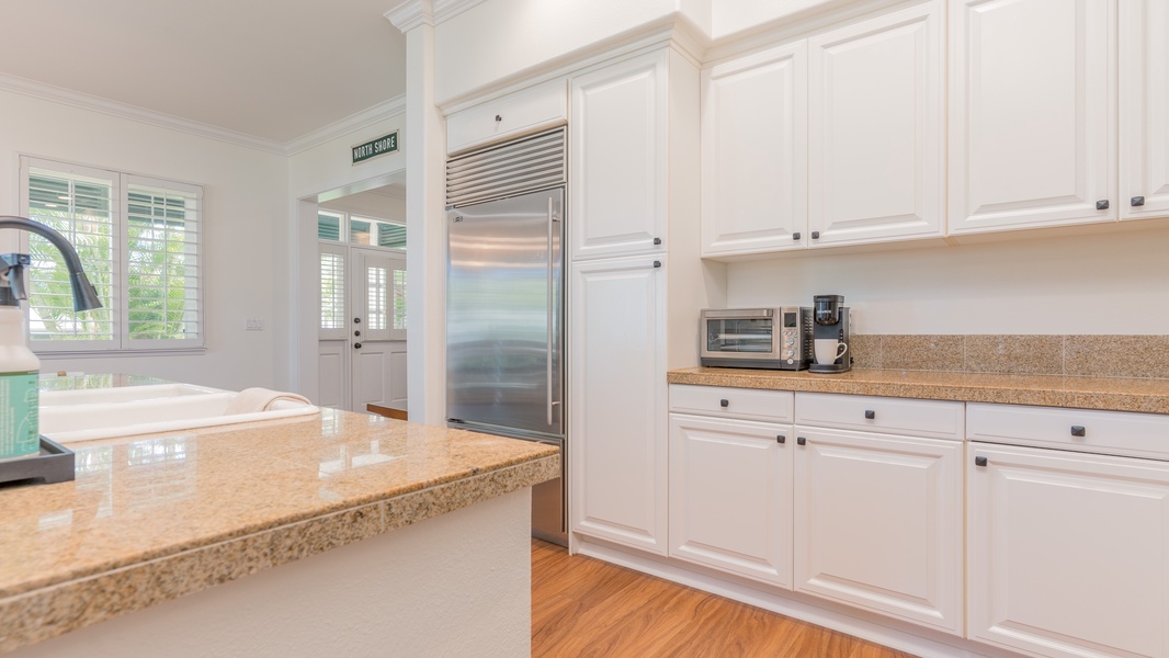 The kitchen is equipped with stainless steel appliances for your culinary adventures.