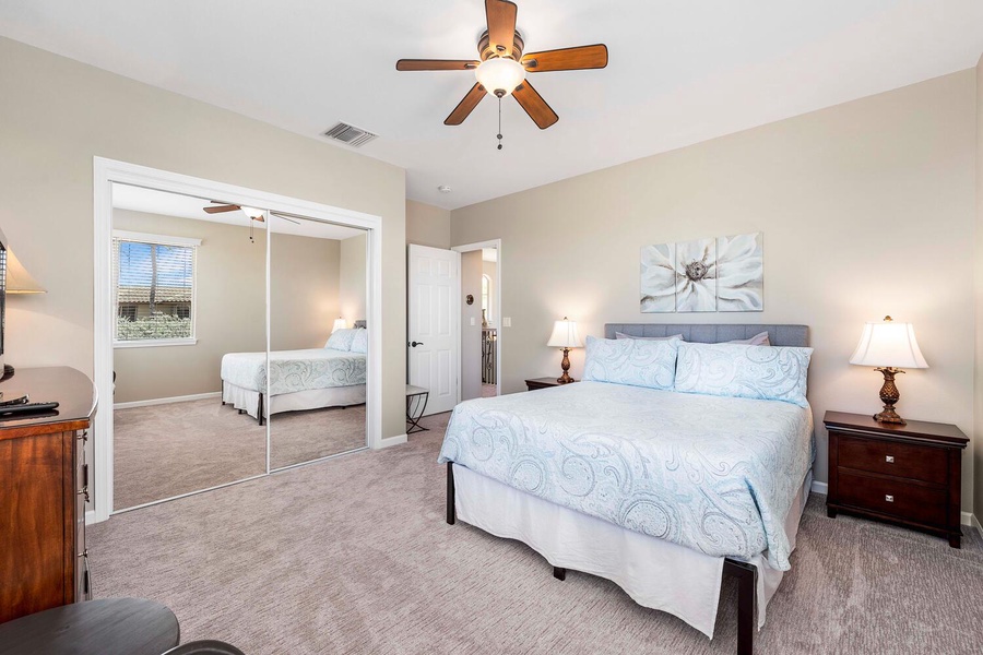 Plenty of storage and flat screen tv in guest room 1.