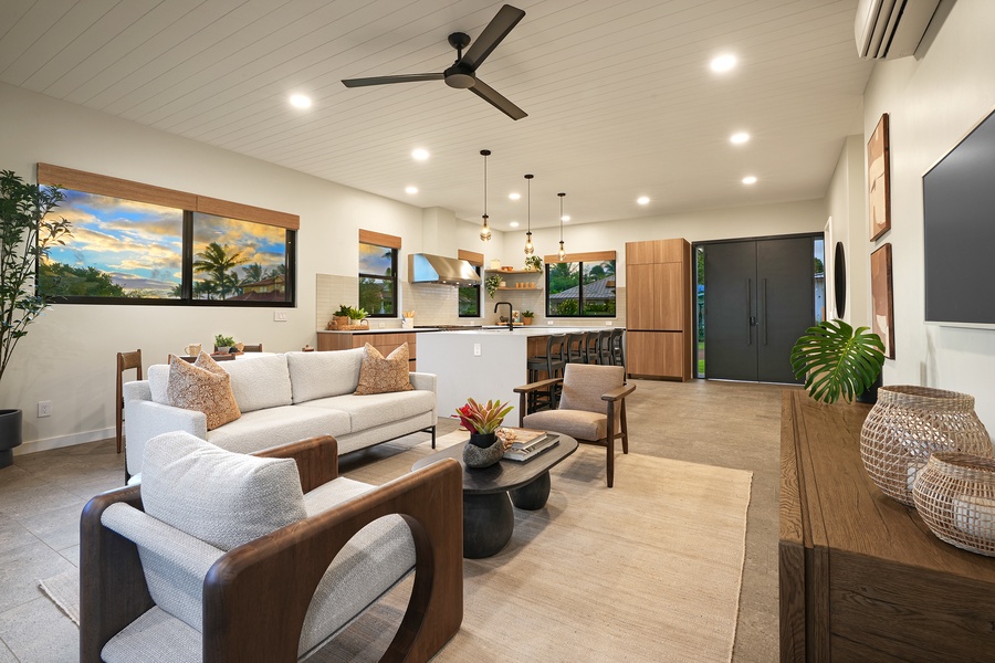 Modern and inviting living room with ample seating and warm, natural accents.