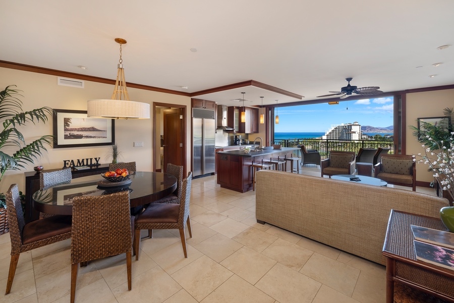 The expansive living room opens to the lanai and captures the beauty of Ko Olina’s coast.