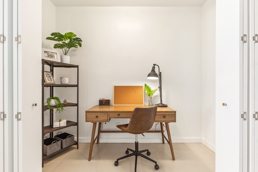 Bright workspace with a modern desk and natural light, perfect for staying productive.