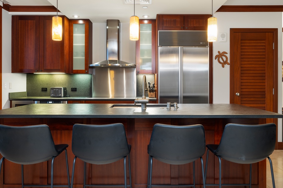 Alternate View of Kitchen with top of the line appliances and breakfast bar.