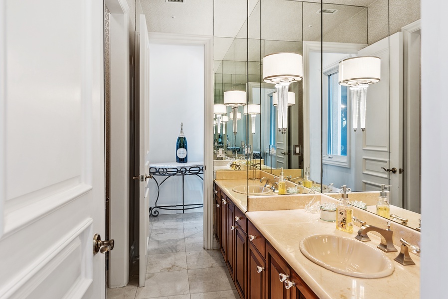 Convenient and stylish lower level powder room, perfect for freshening up during lively gatherings.