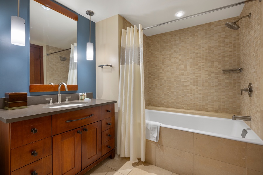 The second guest bathroom with a shower and tub.