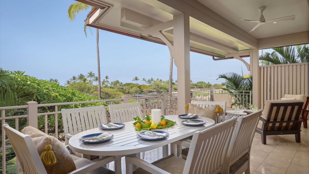 Al fresco dining on the lanai with table for six.