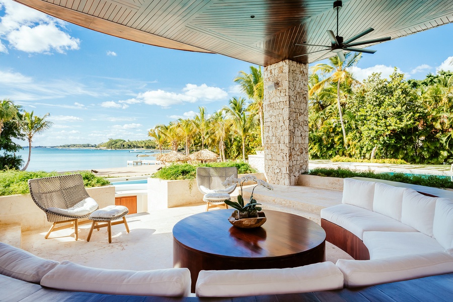 Alternate view of the relaxing outdoor lounge area with stunning ocean views.