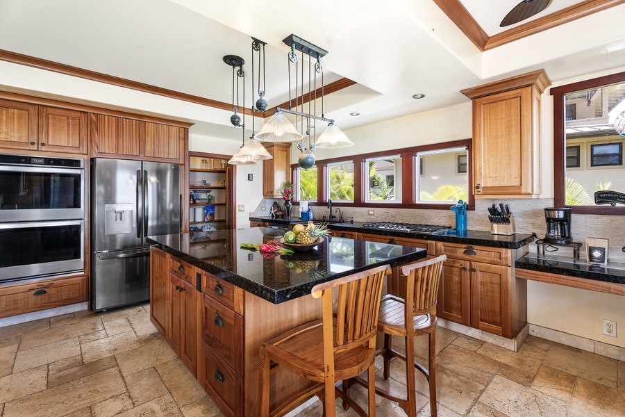 Top-tier appliances and granite countertops—this kitchen is both functional and beautiful.