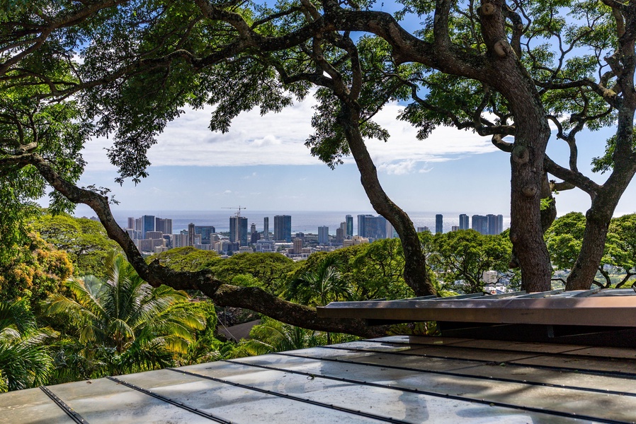 Unwind on the spacious deck with breathtaking views of the Pacific Ocean and the city skyline.