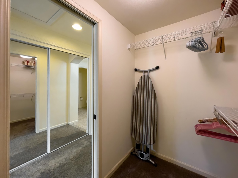 Spacious walk-in closet in the primary bedroom provides plenty of storage for long stays and keeps your island wardrobe organized.