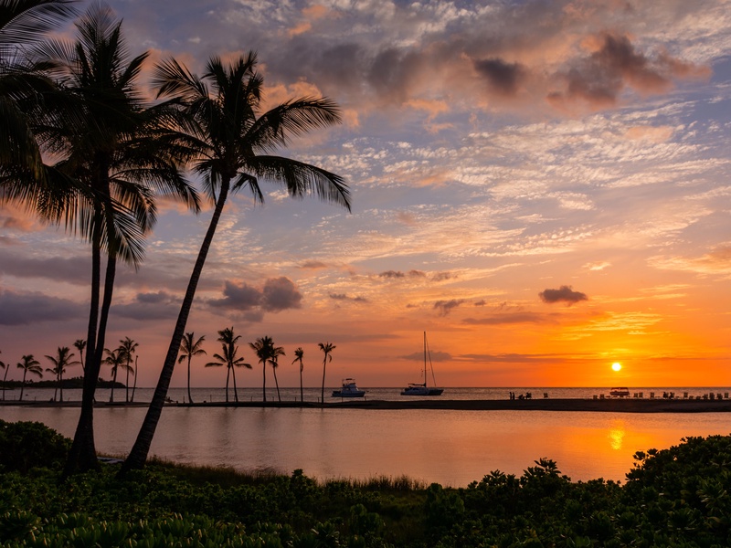 Experience twilight magic as the sky glows over the water—perfect for romantic walks or sunset photography by the sea.