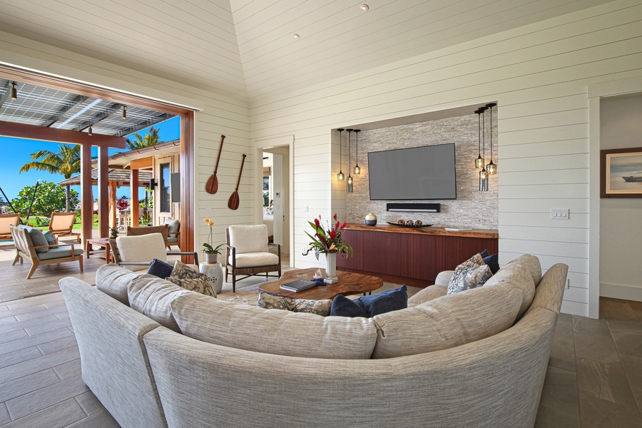 Living room with Smart Tv and Ocean breeze coming through