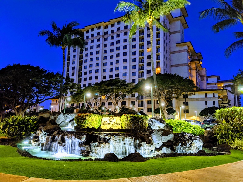 The stunning Beach Villas at Ko Olina glow at night, creating a magical ambiance for a luxury vacation in Hawaii.