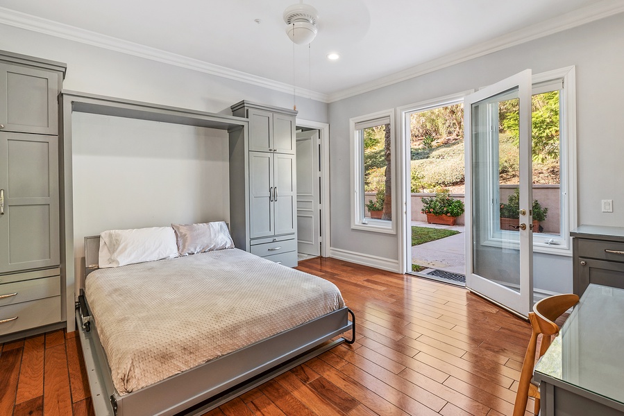 The sixth bedroom suite on the first level with a King size Murphy bed.