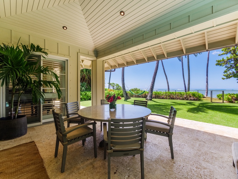 Step onto the lanai and let the gentle ocean breeze caress your senses, offering a tranquil escape where land meets sea.