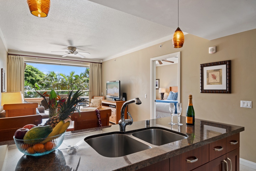 Honua Kai Konea 230/232 includes multiple prep areas and bar seating for casual meals or cocktails