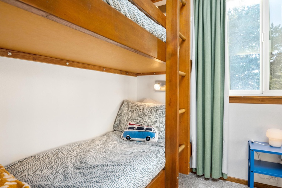 Comfort and convenience blend seamlessly in our bunk beds, featuring soft beddings and dedicated reading lights.