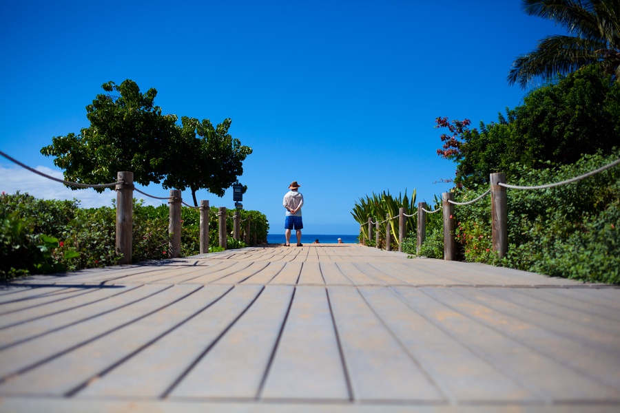 Start your day with a peaceful stroll just outside Honua Kai Konea 204, where nature greets you.