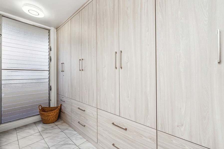 Spacious built-in wardrobe with sleek design, providing ample storage for an organized stay.