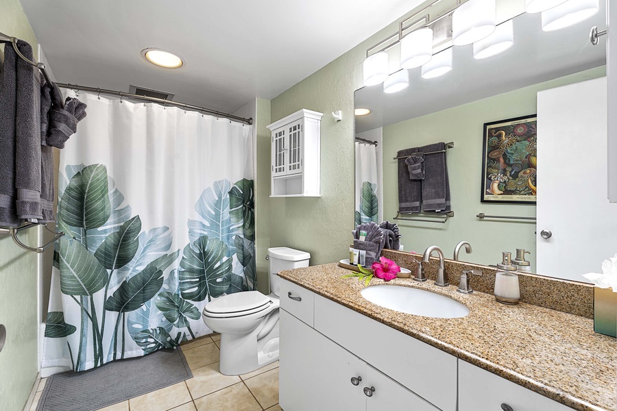 Well-lit mirror on your home's full bathroom with a tub