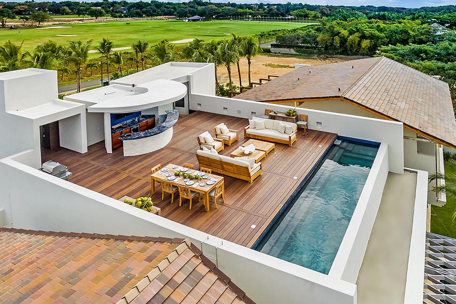 Relax on the rooftop deck, featuring a private pool and comfortable seating areas.