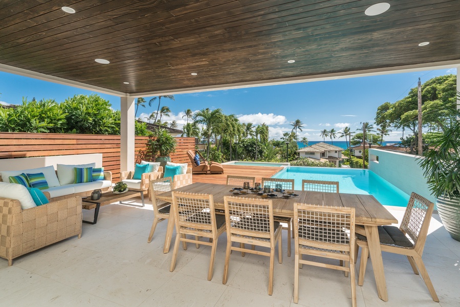 The covered lanai is the perfect place to hangout, complete with pool and ocean views