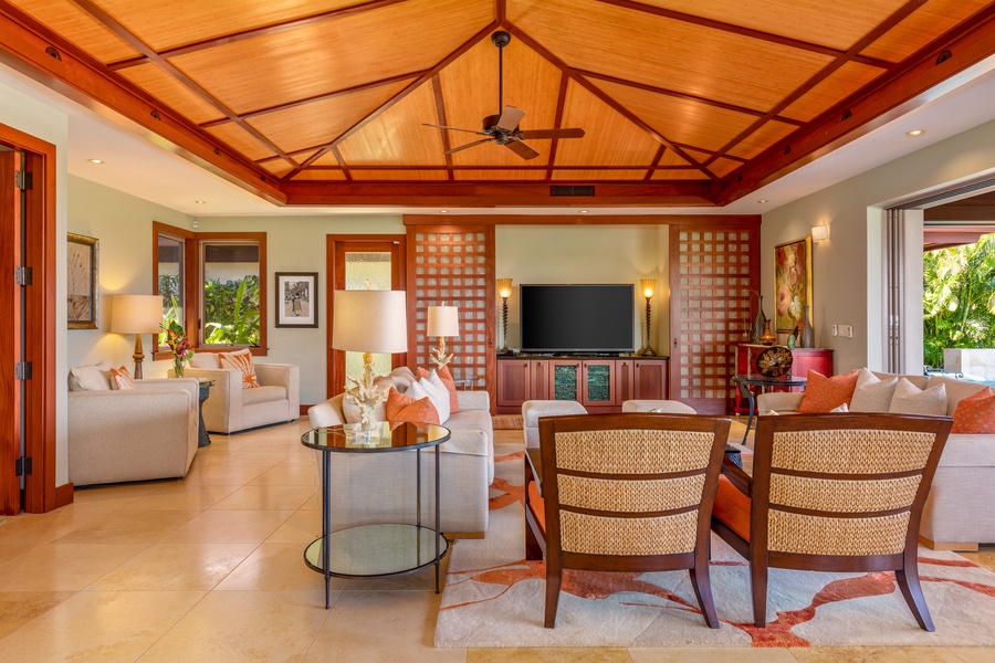 Curl up in the cozy living room with smart TV and comfortable seating for all.
