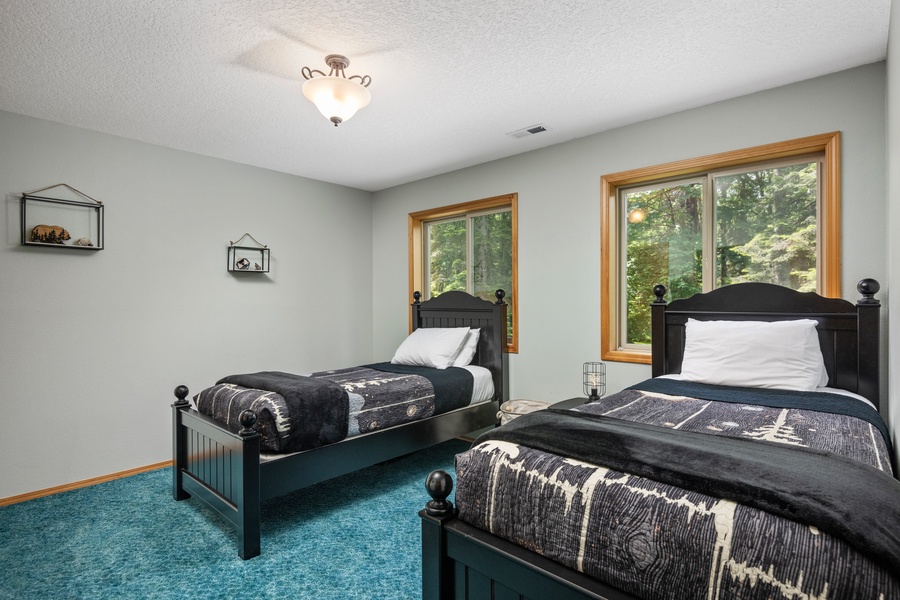 The Bigger Bears Room at the second level comes with two twin XL beds, and two chairs in the hallways can convert into beds to accommodate additional guests for sleepovers in any room needed.