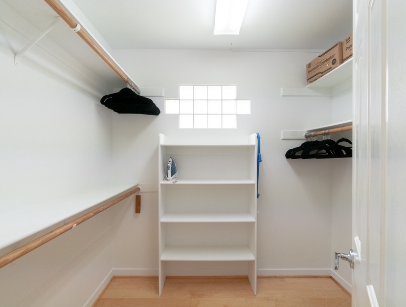Step into a walk-in closet of the master bed, that combines functionality and style