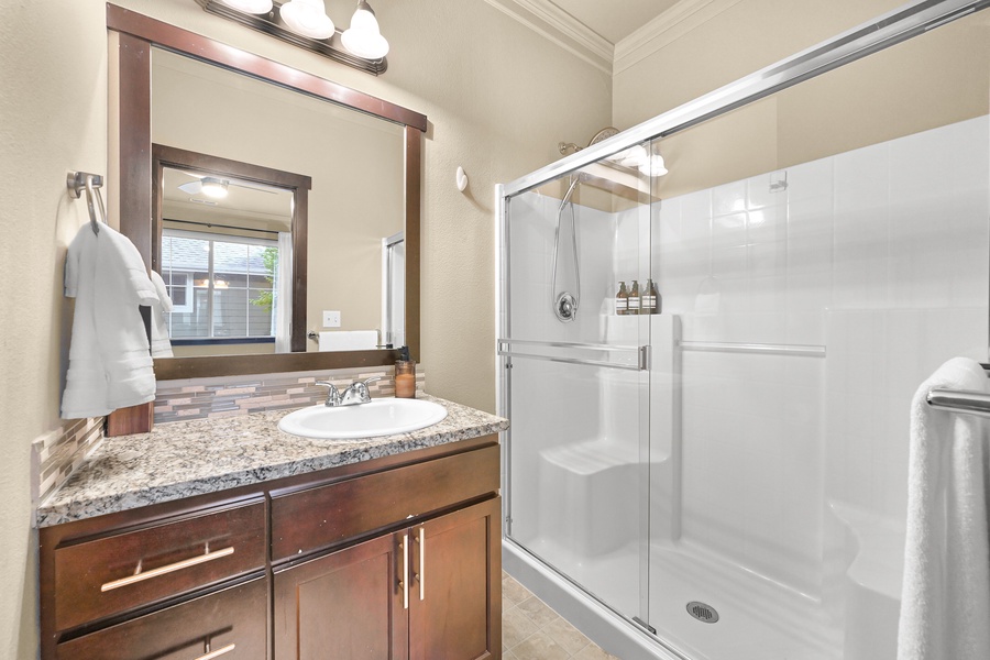 Enjoy the privacy of your ensuite bath complete with a large walk-in shower, granite vanity, and plenty of counter space.