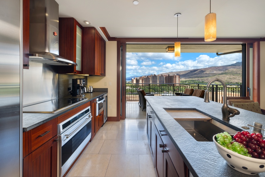 Custom cabinetry and professional-grade appliances make the kitchen a dream for home chefs.