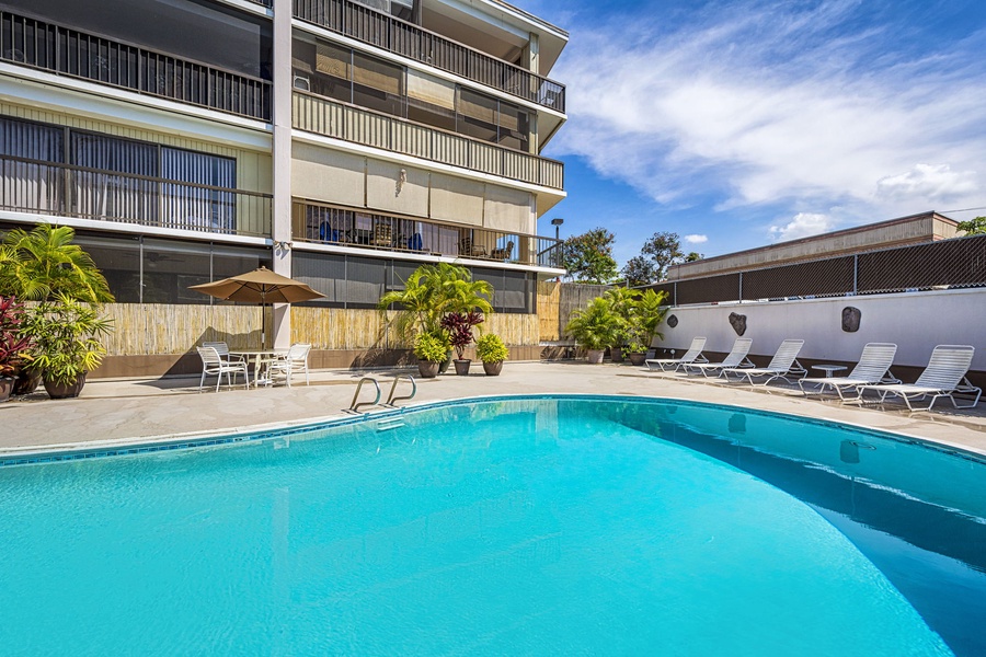Sparkling pool area perfect for a refreshing swim and soaking up the Hawaiian sun.