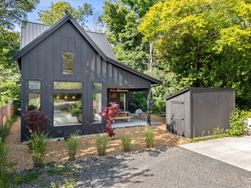 Modern design meets nature at the stylish entry to The Black Squirrel.
