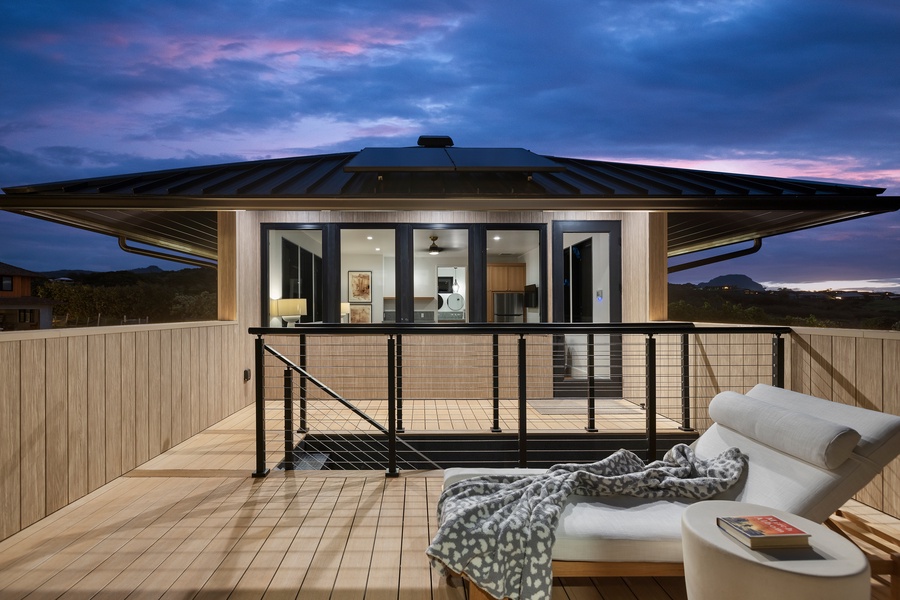 Sip wine under painted skies on your private lanai, surrounded by the beauty of South Shore sunsets.