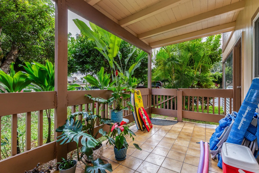 The lanai offers ultimate relaxation surrounded by lush array of tropical plants.