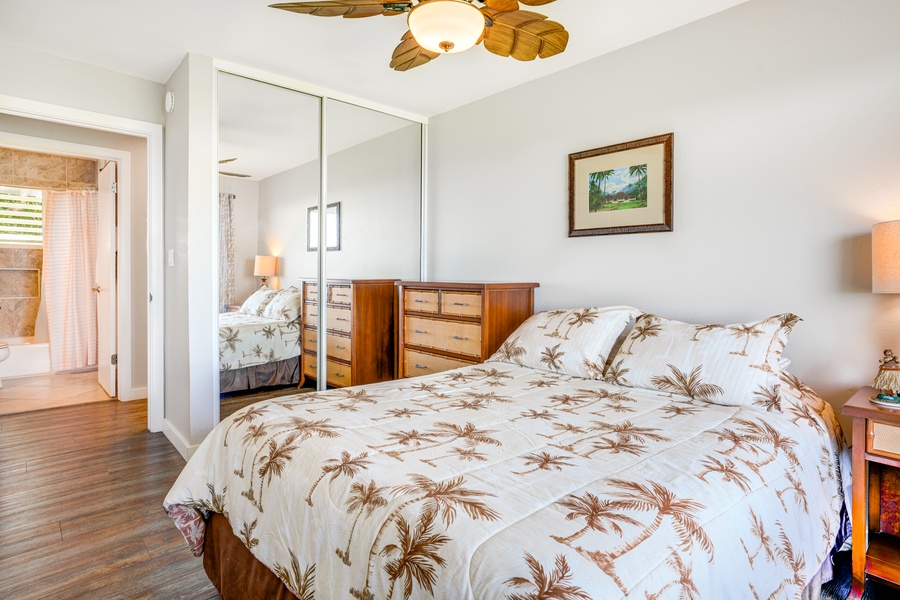 Reflecting comfort and style, this bedroom boasts a large mirrored closet for your getaway gear.