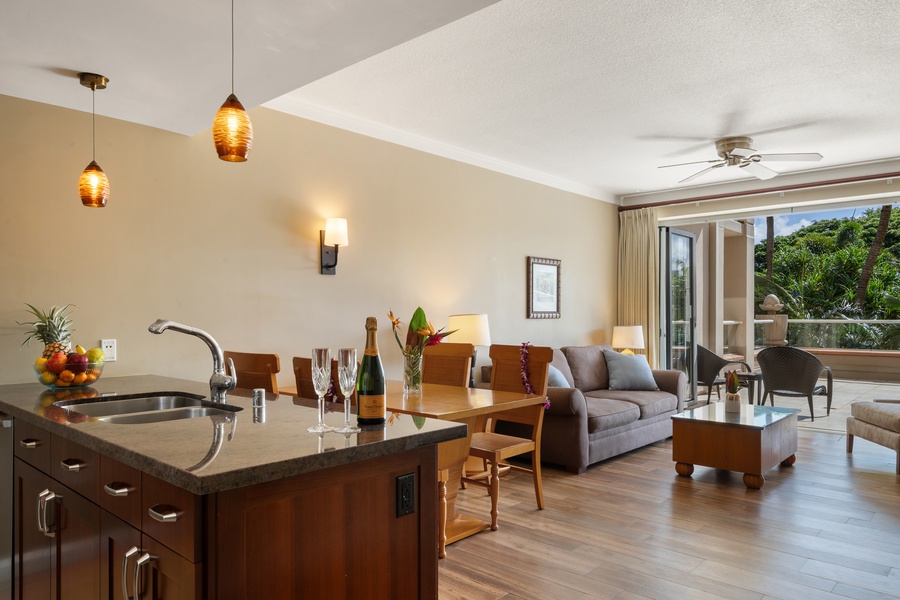 This open kitchen and living layout in Honua Kai Konea 230/232 keeps everyone connected.