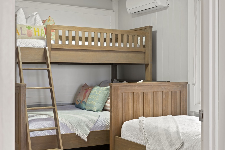 Bedding includes a full/single bunk bed and twin bed