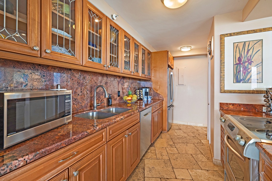 The kitchen at Royal Kahana 610 is well-equipped with everything you need, offering plenty of counter space for easy meal prep.