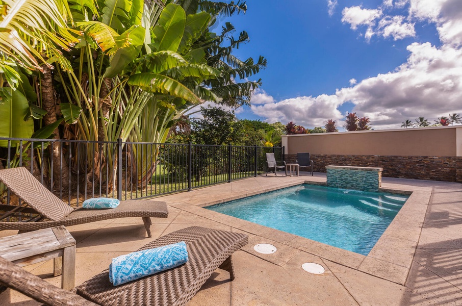 At Pohaku Villa, relax by your own gated saltwater pool with ample loungers and serene garden surroundings.