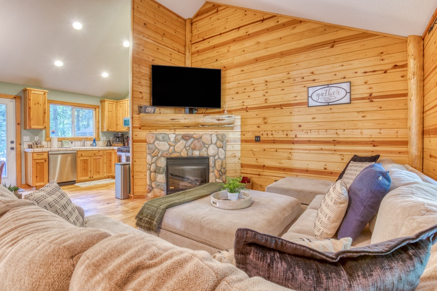 Step inside and you'll find a cozy living area with a flatscreen TV and fireplace