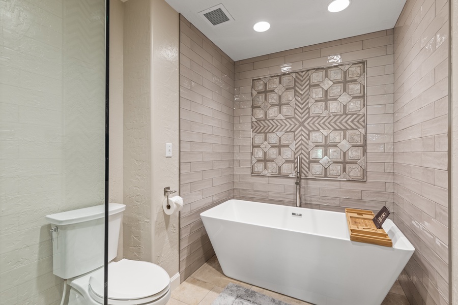 Beautiful tile work and soaking tub